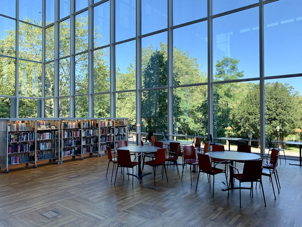 three round white wooden tables