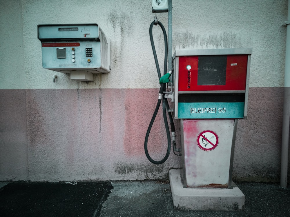 red and gray gasoline station