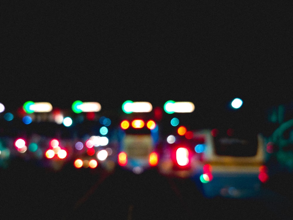 a blurry photo of a city street at night