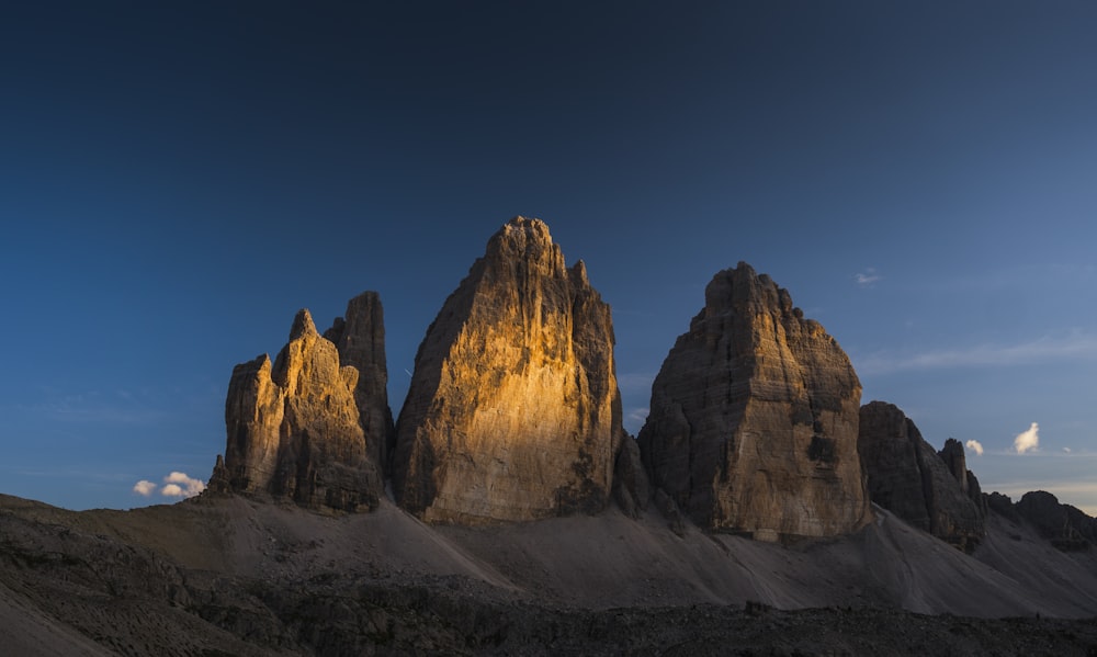 black and brown rock formations during golden hour