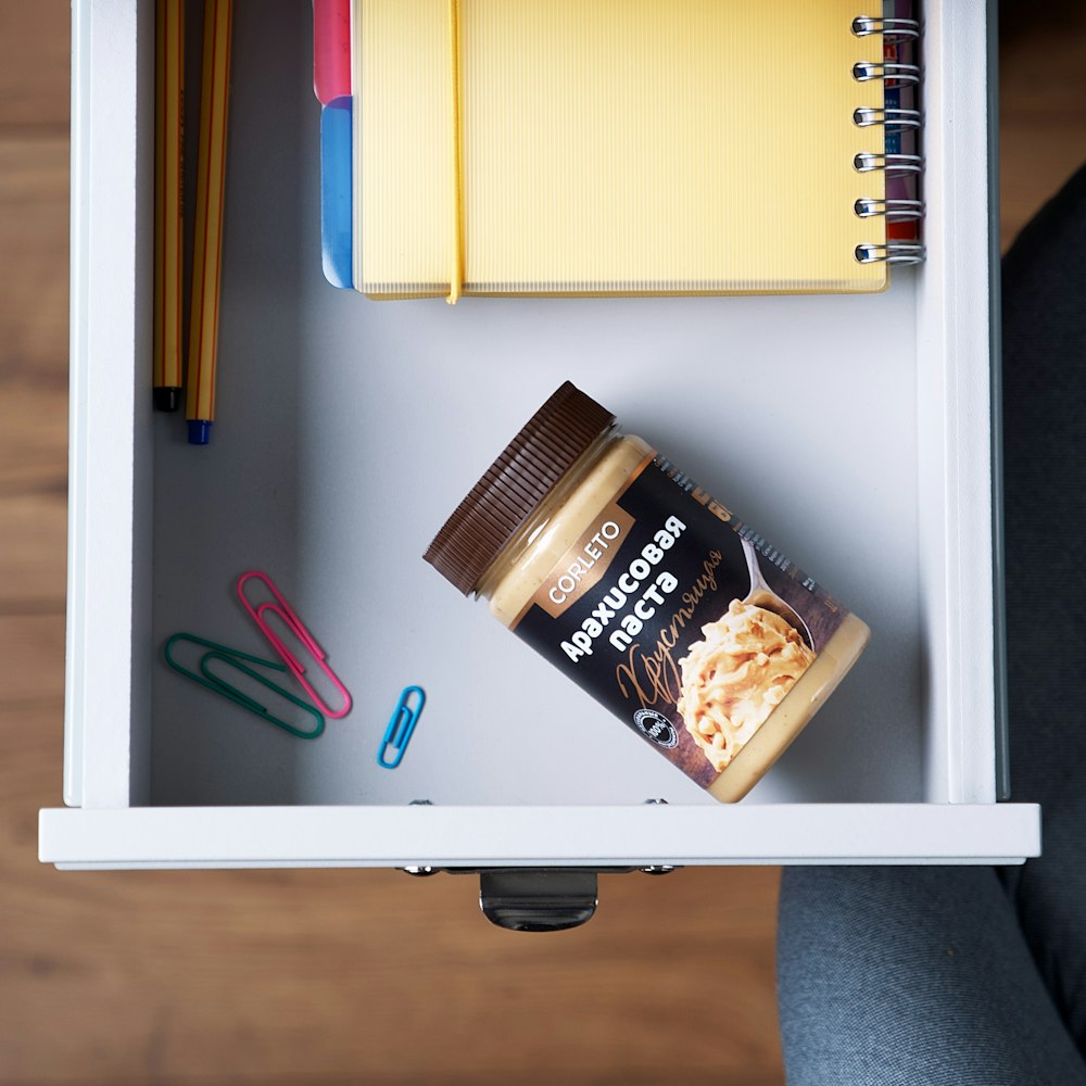 three clip and butter jar on drawer