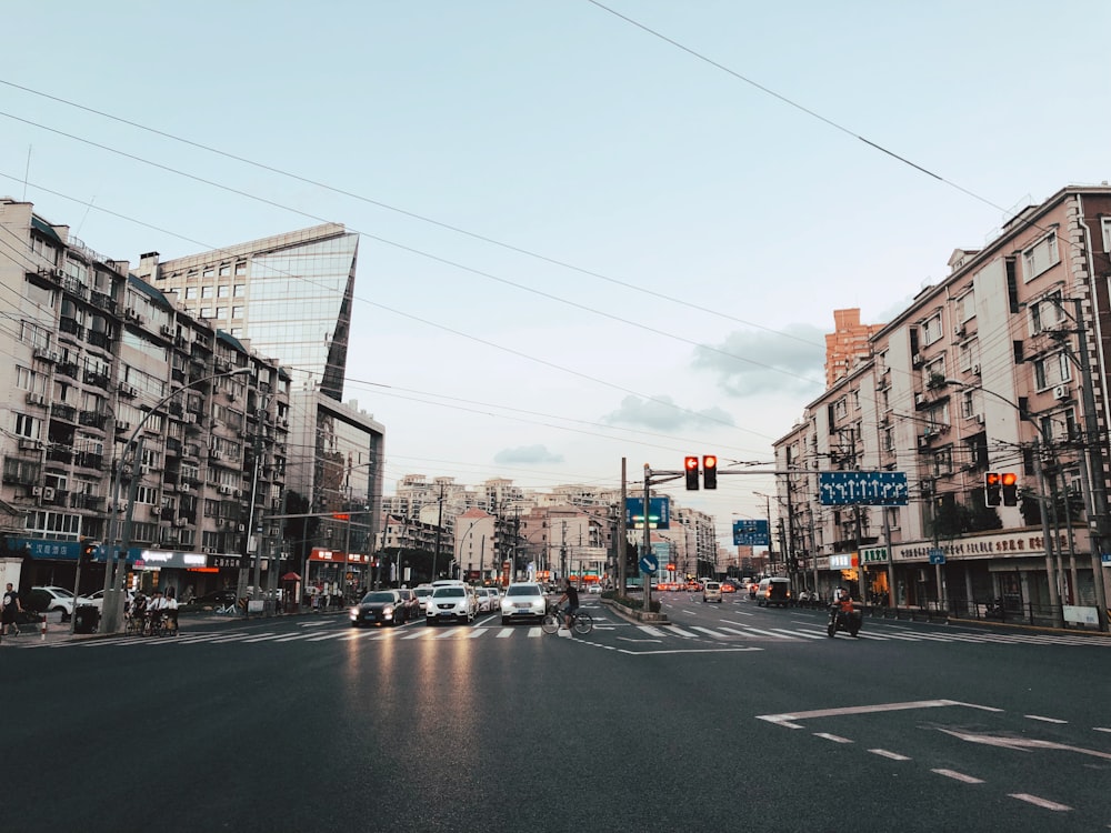 photography of vehicles traveling on road during daytime