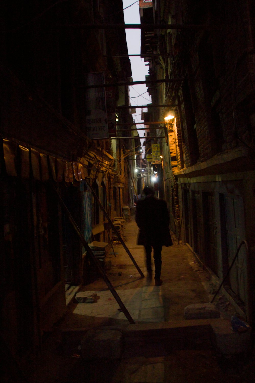 man walking in the alley