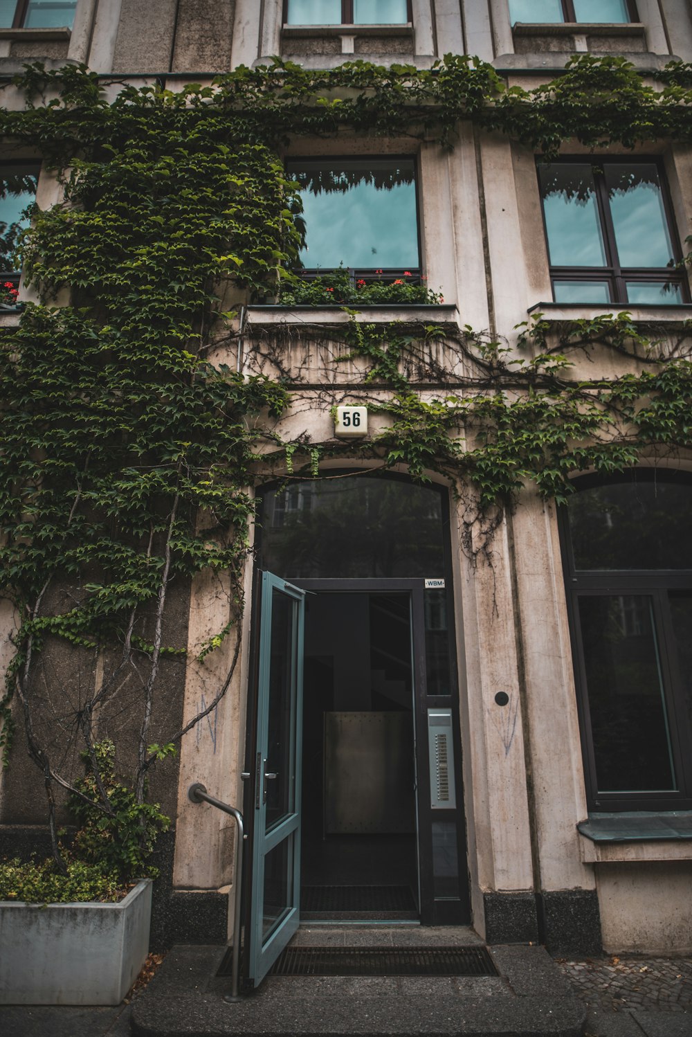 low angle photography of brown concrete building structure