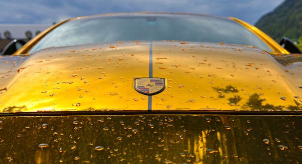closeup photo of yellow and black Lamborghini vehicle