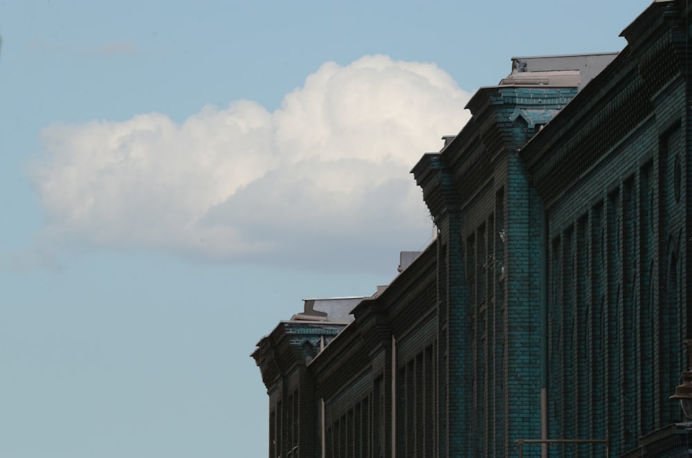 a large building with a clock on the side of it