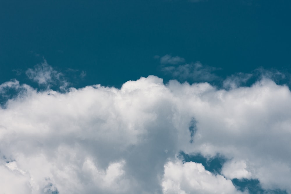 cumulus clouds on blue sky