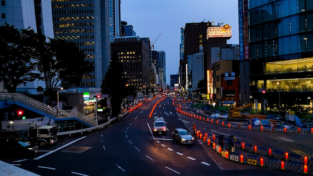 vehicles running on road at night