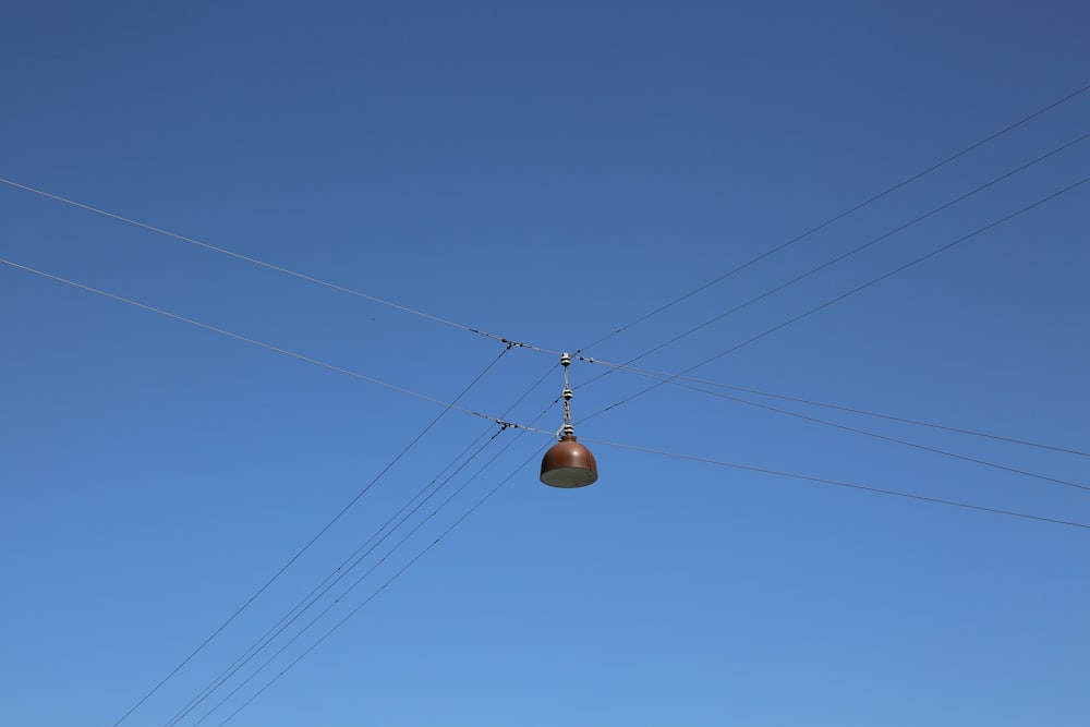 a cable car with a sky background