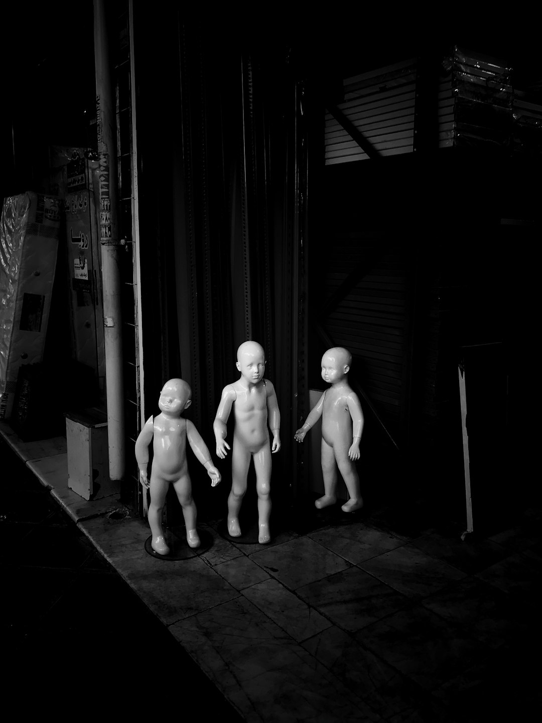three boy mannequins