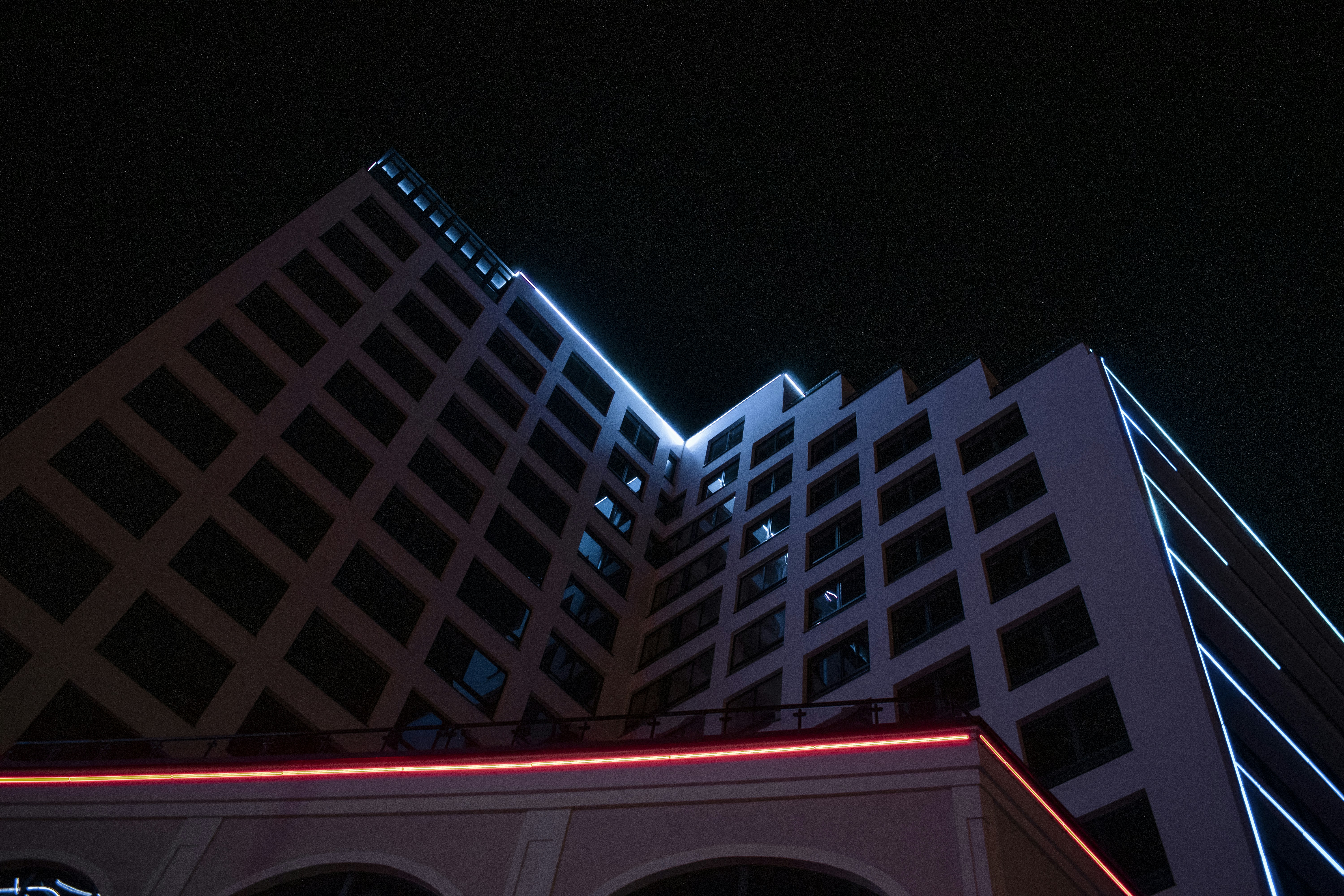 Modern brutalist architecture at night