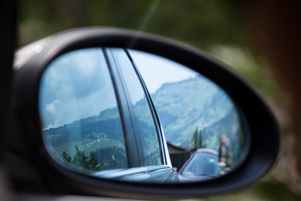 black side-mirror close-up photography