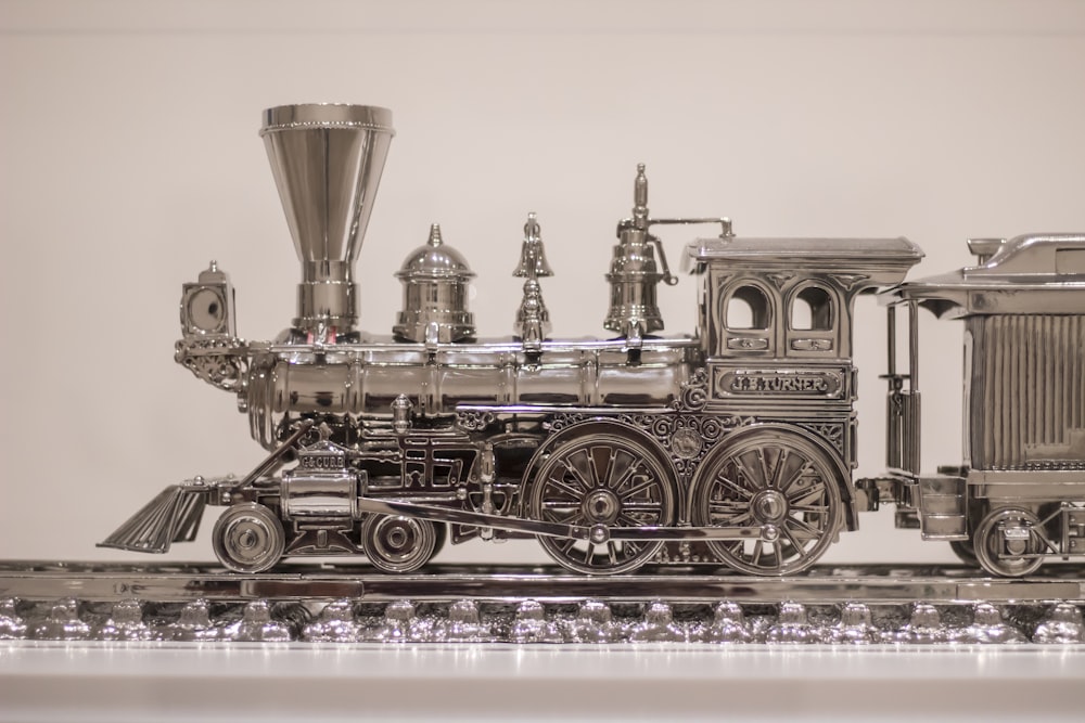 gray steel train scale model