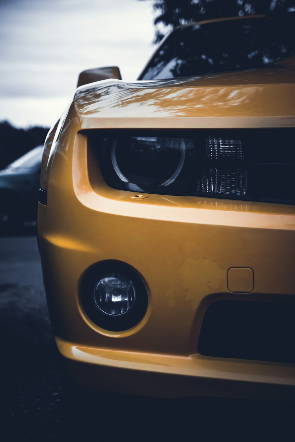 yellow car close-up photography