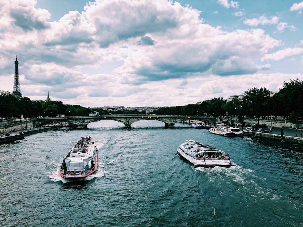 two boat near bridge