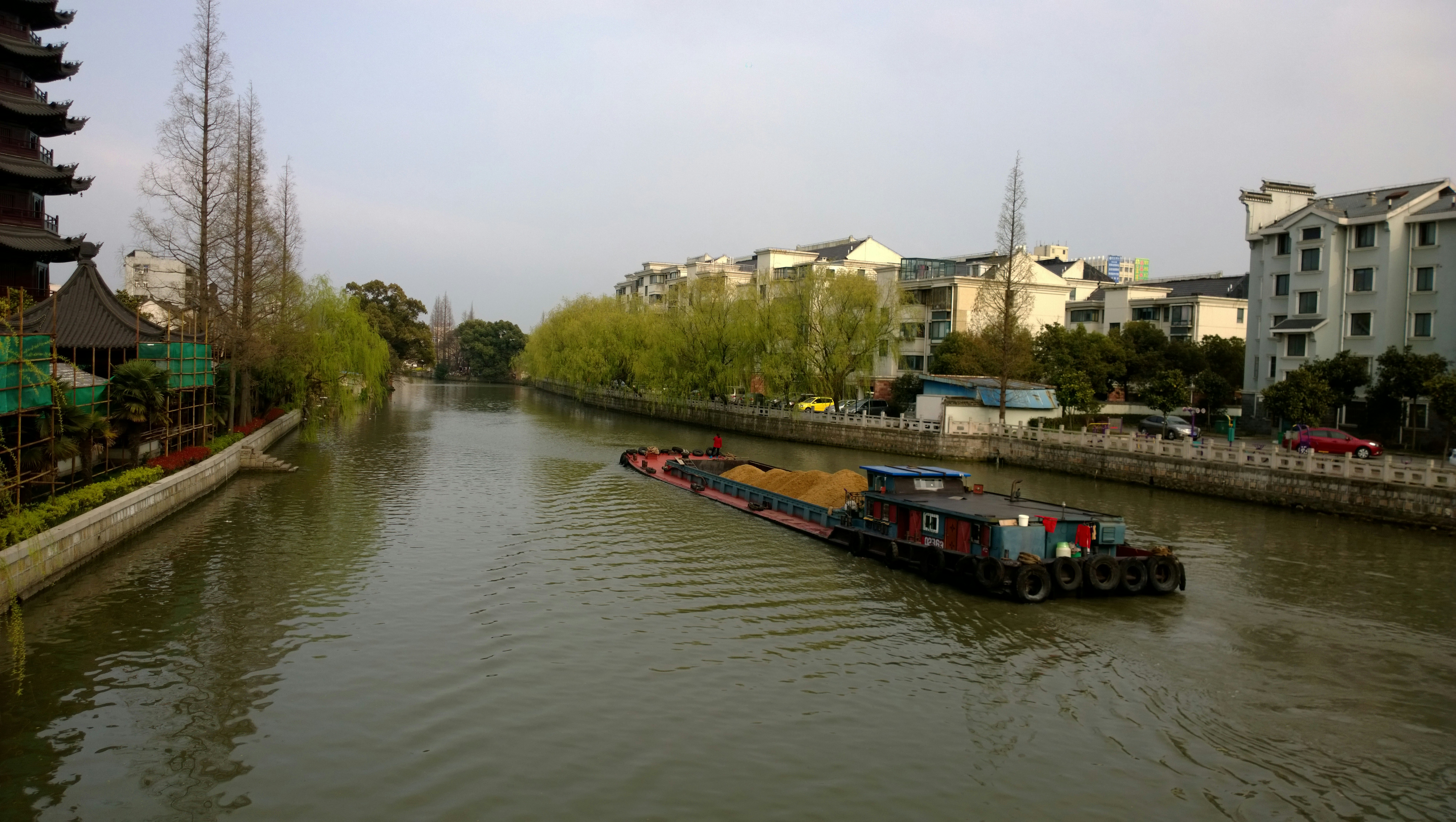 boat at the river near the city