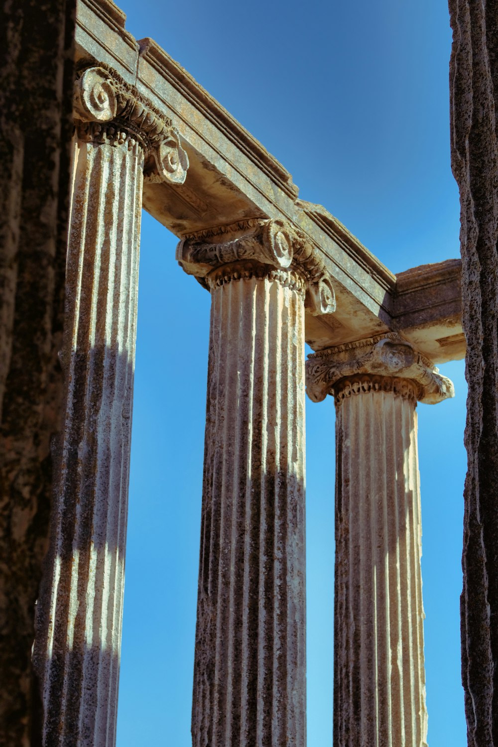 architectural photography of brown monument column