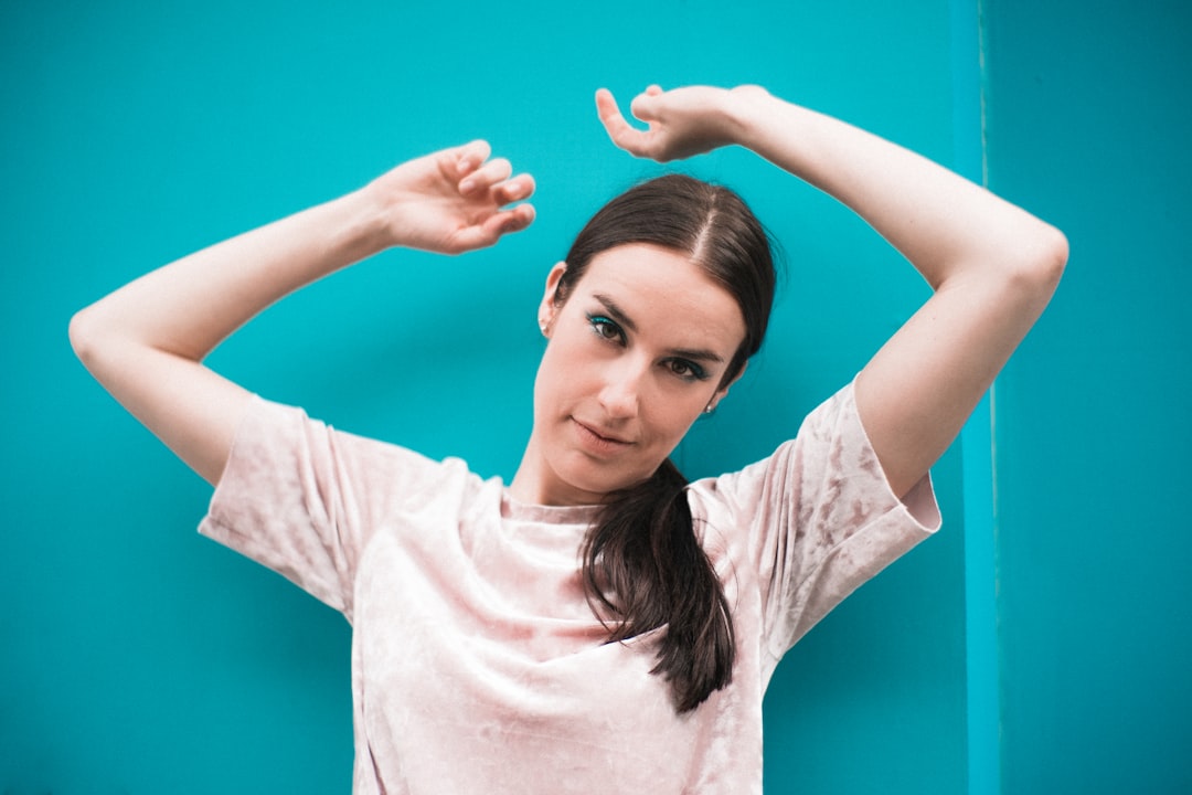 woman in pink shirt