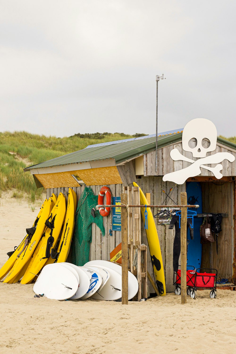 yellow paddle and skim board lot