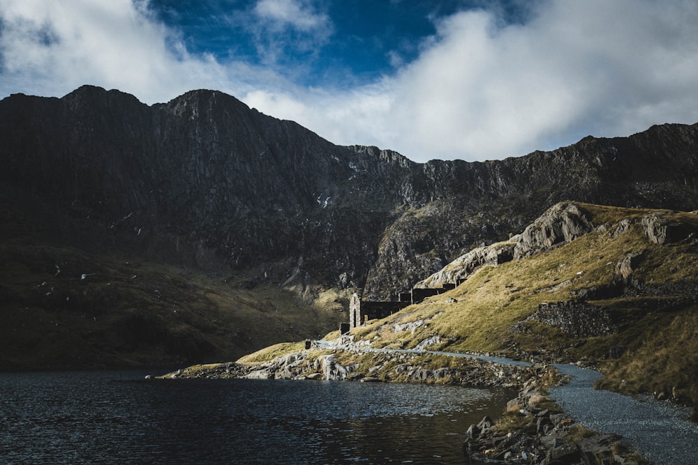 mountains near body of water during daytime