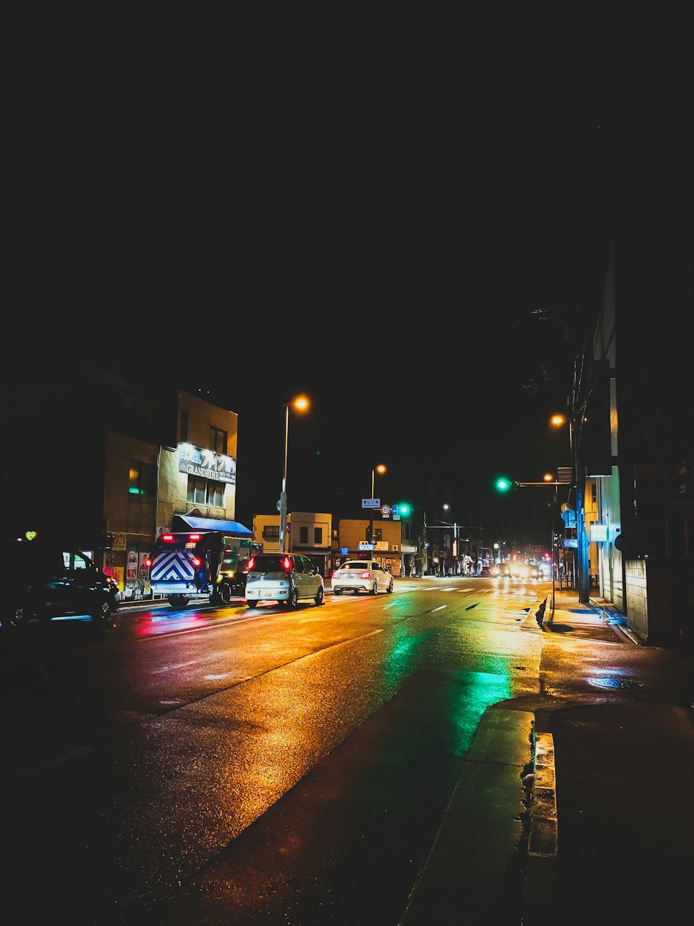 vehicle passing on road during night