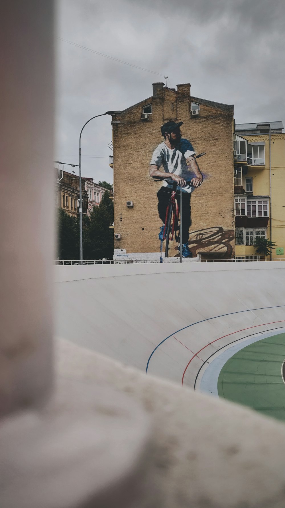 man riding bicycle looking at his left