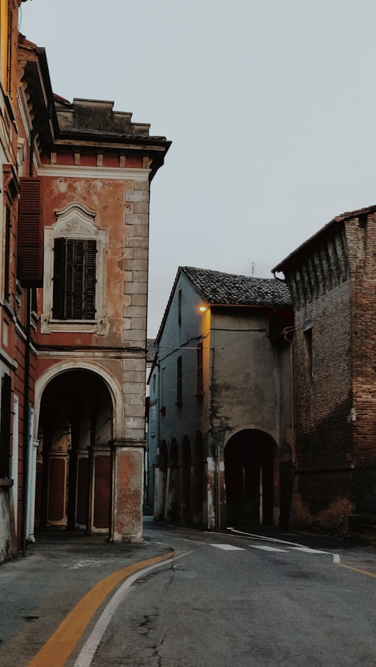 brown building near road during daytime close-up photography in Via Giuseppe Garibaldi Italy