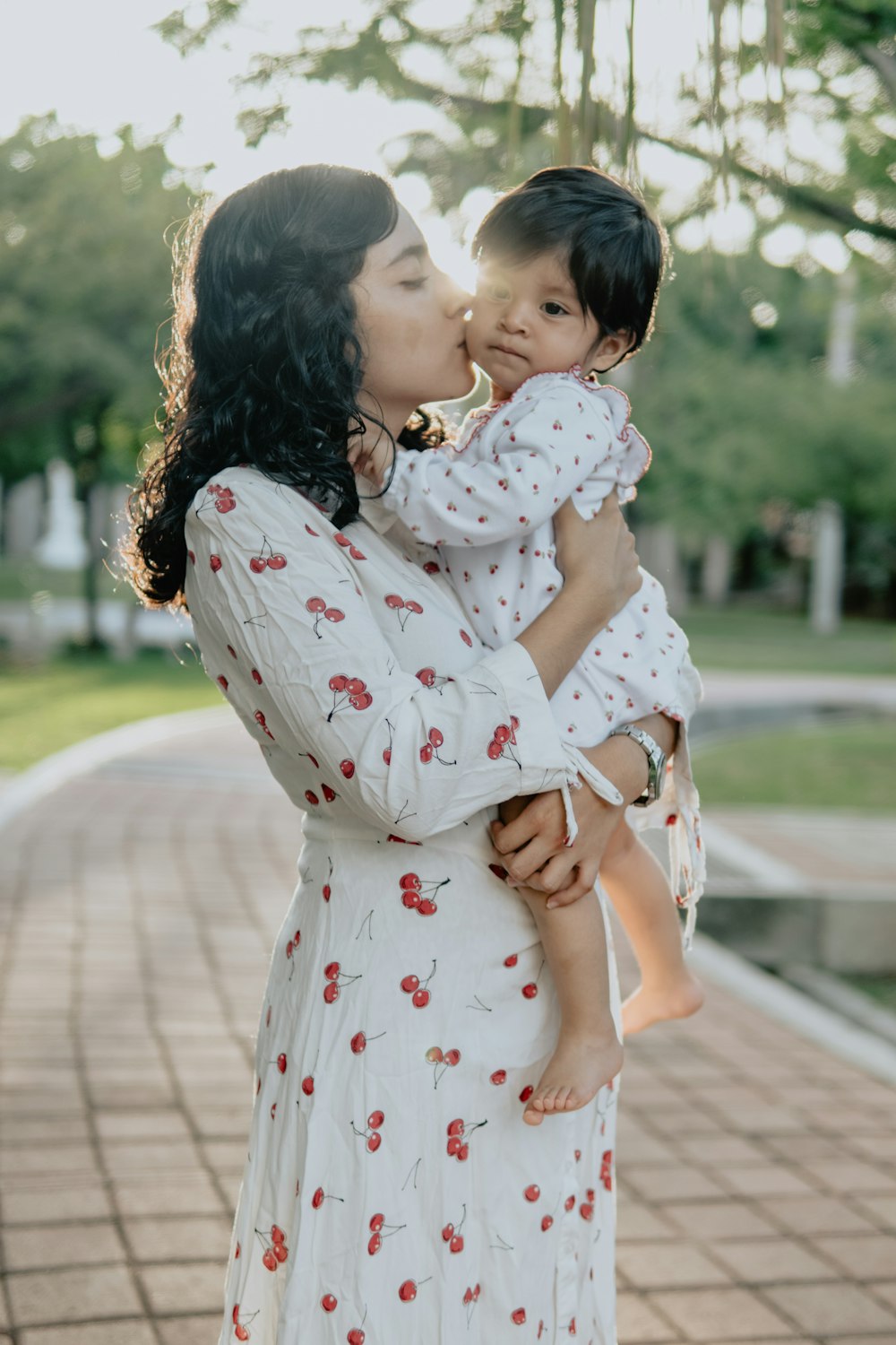 woman holding baby