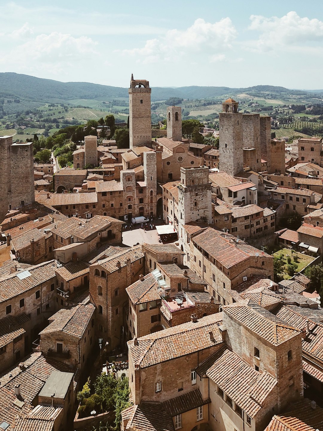 aerial photo of brown buildings