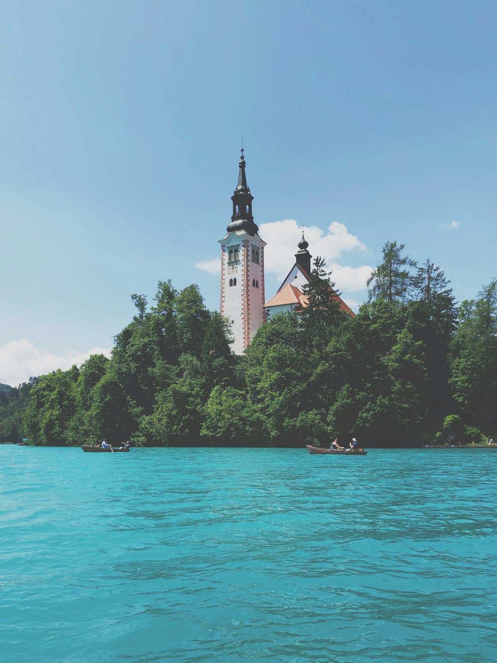 white and beige lighthouse during daytime