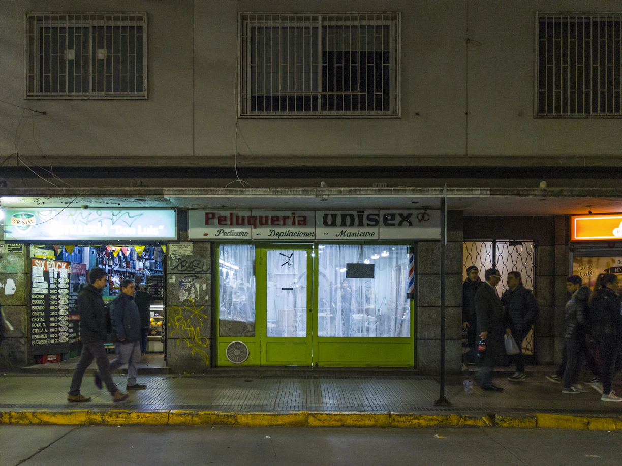 people walking and standing near building