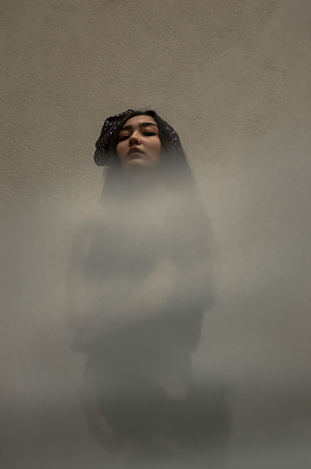 woman behind clouds