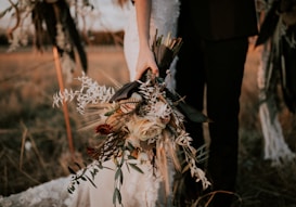 woman holding flower bouquet