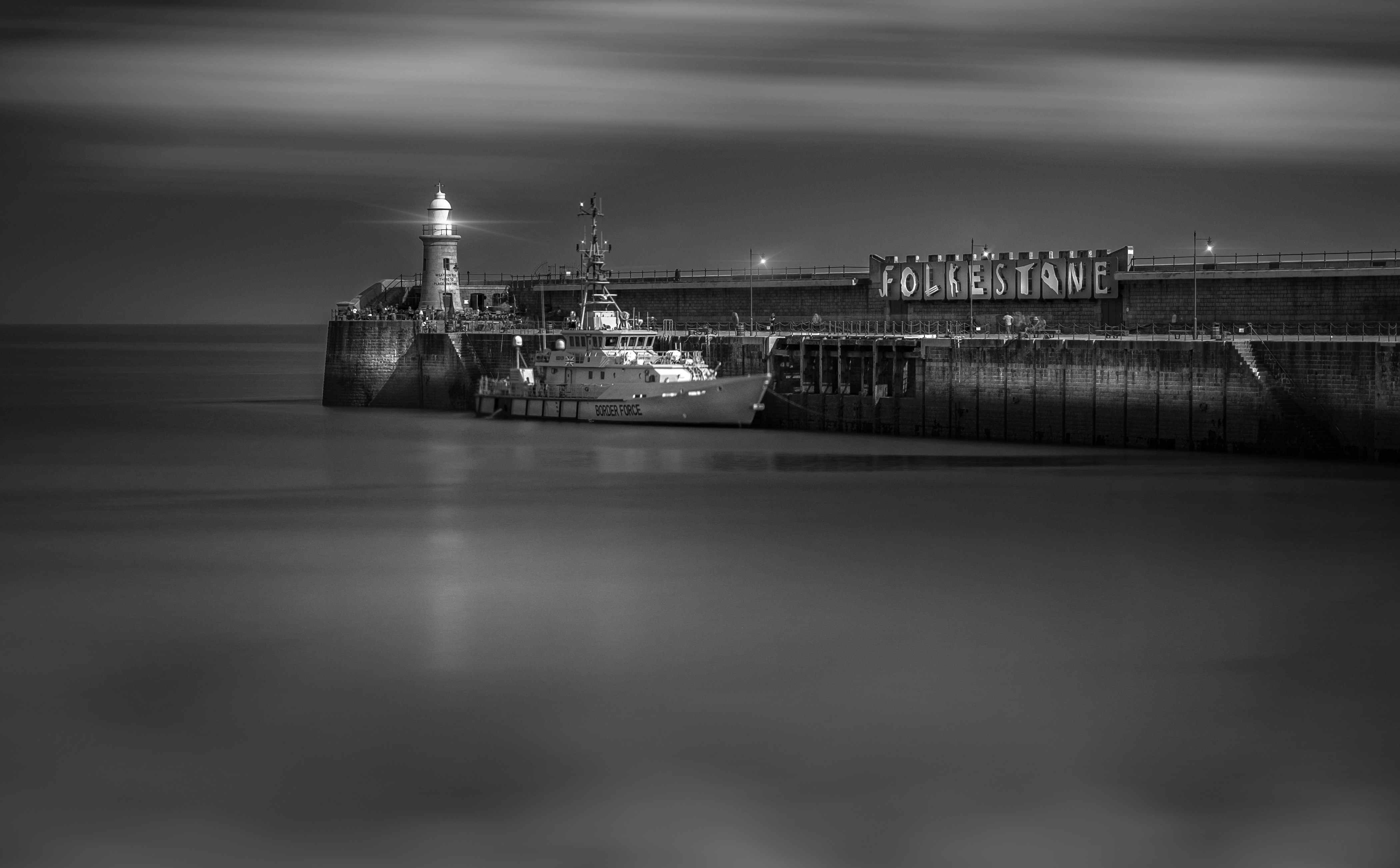 grayscale photo of dock