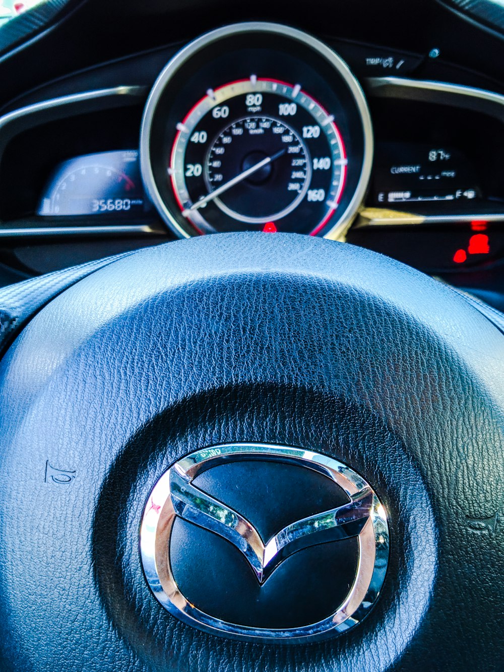 black Mazda steering wheel