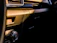 Close-up of a sparkling clean car dashboard after professional home cleaning.