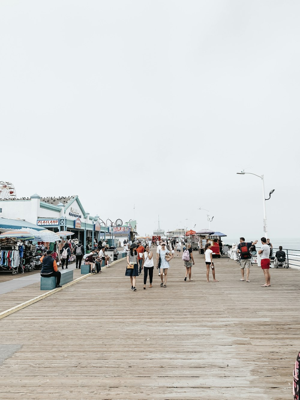 people in port under white sky