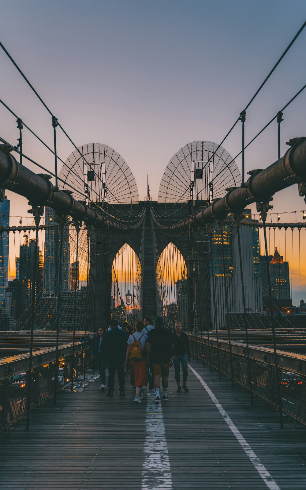 people walking on bridge