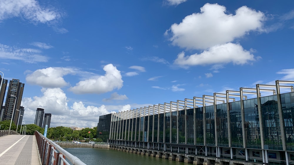 gray building near body of water