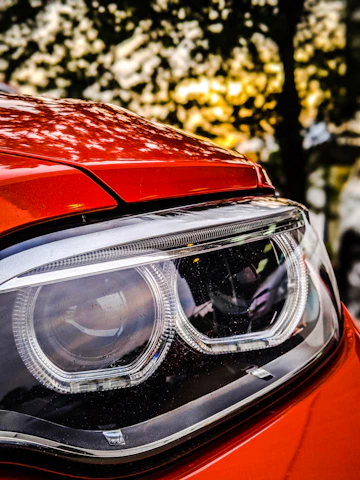 vehicle headlight in close up photo