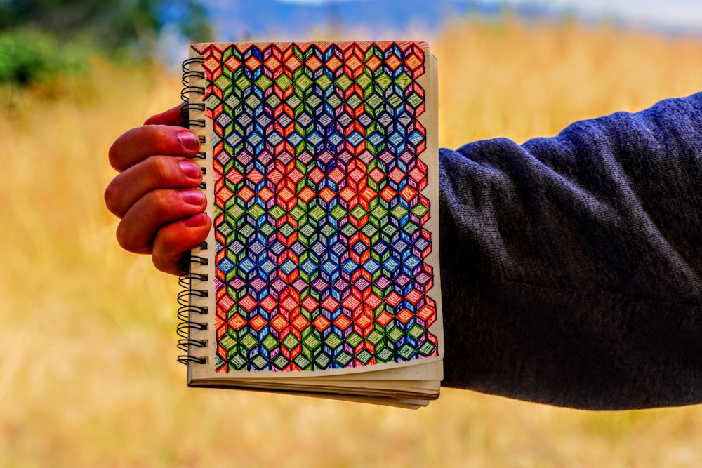 person holding book