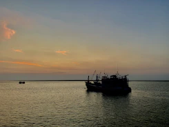 Soft pastel illustration of a fishing boat on calm blue waters at sunrise