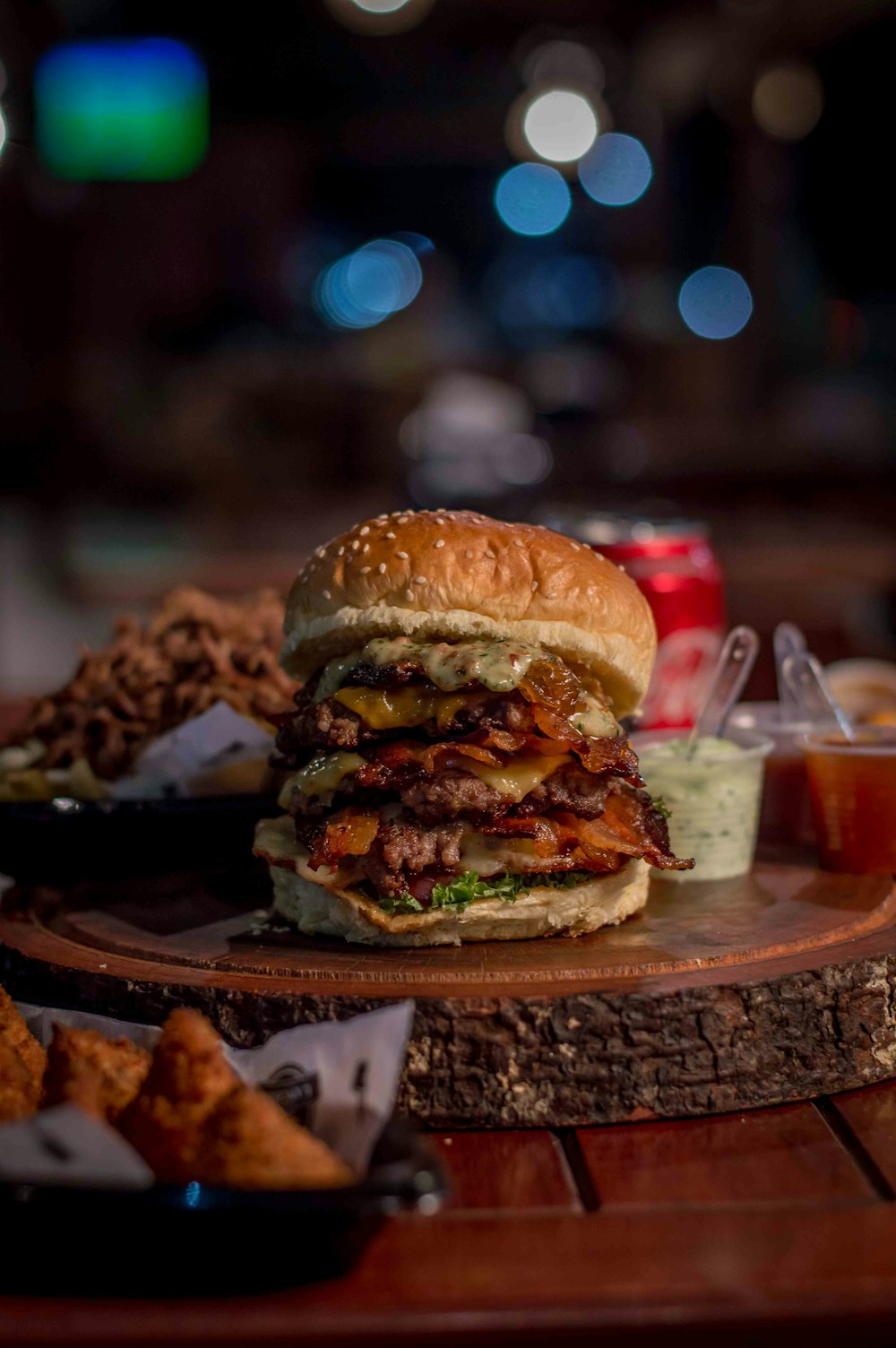 hamburger beside dips on slab