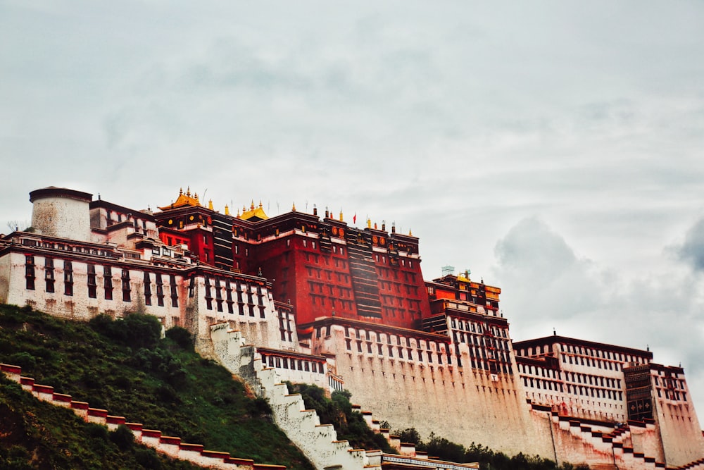 red concrete temple on the hill