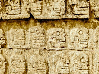 Beyond Chichen Itza - Hidden Mayan Ruins in Mexico mayan skull embossed on concrete