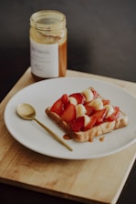 baked bread with strawberry in plate