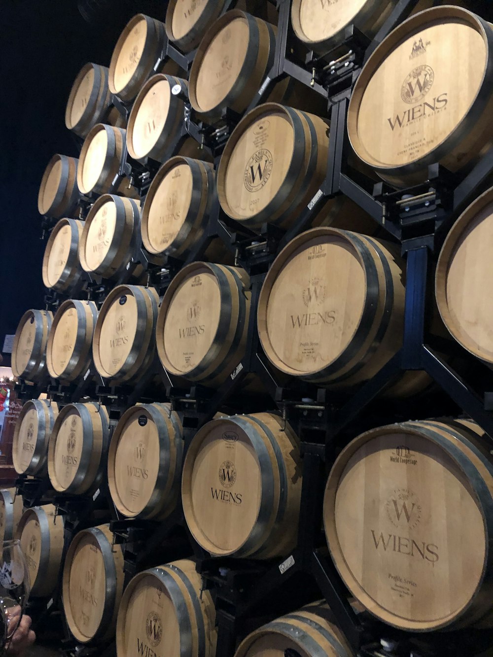 brown wooden barrel lot close-up photography