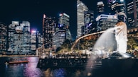 A group of travelers enjoying a guided city tour in Singapore with iconic skyline views.