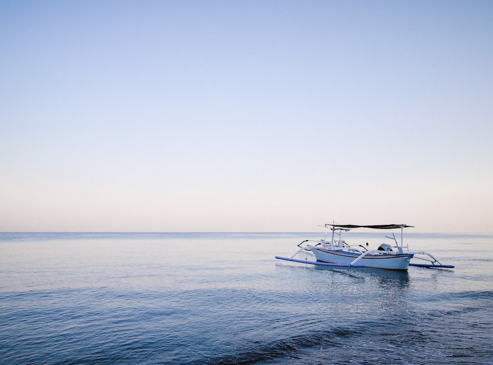 boat on body of water during daytime