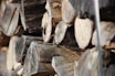 Close-up of seasoned firewood logs ready for sale, showing texture and grain.